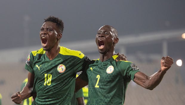 YAOUNDE, CAMEROON - JANUARY 30: ISMAÏLA SARR celebrates scoring Senegal's third goal with SALIOU CISS (2) during the Africa Cup of Nations (CAN) 2021 quarter-final football match between Senegal and Equatorial Guinea at Stade Ahmadou Ahidjo in Yaounde on January 30, 2022. (Photo by