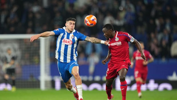 BARCELONA, SPAIN - APRIL 18: Roberto Fernandez Jaen of RCD Espanyol battles for possession with Dakonam Djene of Getafe CF during the LaLiga match between RCD Espanyol de Barcelona and Getafe CF at RCDE Stadium on April 18, 2025 in Barcelona, Spain. (Photo by Alex Caparros/Getty Images)