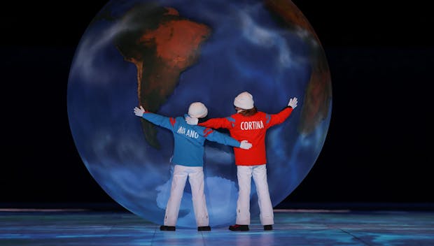 BEIJING, CHINA - FEBRUARY 20: Children representing Milan and Cortina hug a globe as part of the handover ceremony during the Beijing 2022 Winter Olympics Closing Ceremony on Day 16 of the Beijing 2022 Winter Olympics at Beijing National Stadium on February 20, 2022 in Beijing, China. (Photo by Maja Hitij/Getty Images)