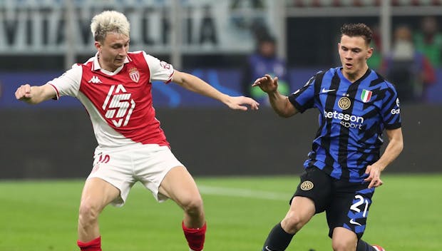 MILAN, ITALY - JANUARY 29: Aleksandr Golovin of AS Monaco controls the ball whilst under pressure from Kristjan Asllani of FC Internazionale during the UEFA Champions League 2024/25 League Phase MD8 match between FC Internazionale Milano and AS Monaco at Stadio San Siro on January 29, 2025 in Milan, Italy. (Photo by Marco Luzzani/Getty Images)