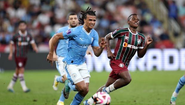 JEDDAH, SAUDI ARABIA - DECEMBER 22: Nathan Ake of Manchester City runs with the ball during the FIFA Club World Cup Saudi Arabia 2023 Final between Manchester City and Fluminense at King Abdullah Sports City on December 22, 2023 in Jeddah, Saudi Arabia. (Photo by Francois Nel/Getty Images)