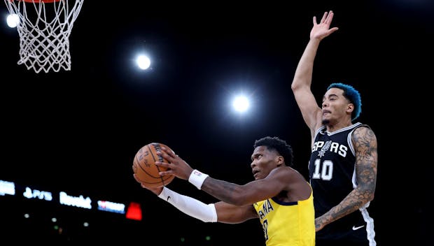 PARIS, FRANCE - JANUARY 25: Bennedict Mathurin #00 of the Indiana Pacers shoots the ball against Jeremy Sochan #10 of the San Antonio Spurs during the second quarter in the Paris NBA game between the Indiana Pacers and San Antonio Spurs at The Accor Arena on January 25, 2025 in Paris, France. NOTE TO USER: User expressly acknowledges and agrees that, by downloading and or using this photograph, User is consenting to the terms and conditions of the Getty Images License Agreement. (Photo by Dean Mouhtaropoulos/Getty Images)