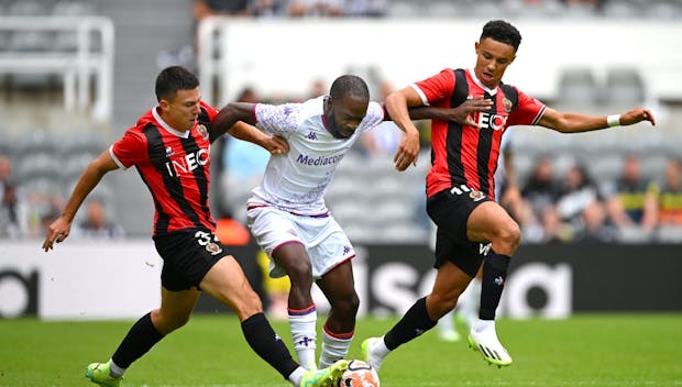 NEWCASTLE UPON TYNE, ENGLAND - AUGUST 06: Tom Louchet (l) and Sofiane Diop (r) of Nice challenge Nanitamo Ikone of ACF Fiorentina during the pre-season friendly match between ACF Fiorentina and OGC Nice at St James' Park on August 06, 2023 in Newcastle upon Tyne, England. (Photo by Stu Forster/Getty Images)