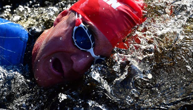 KUOPIO, FINLAND - AUGUST 14: Athletes in action on the swim leg during the IRONMAN Finland Kuopio-Tahko on August 14, 2021 in Kuopio, Finland. (Photo by Alexander Koerner/Getty Images for IRONMAN)
