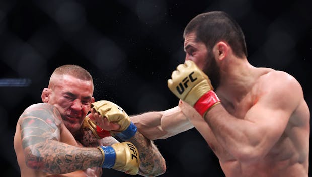 NEWARK, NEW JERSEY - JUNE 01: (L-R) Dustin Poirier and Islam Makhachev of Russia exchange strikes in their lightweight title bout during UFC 302 at Prudential Center on June 01, 2024 in Newark, New Jersey. (Photo by Luke Hales/Getty Images)